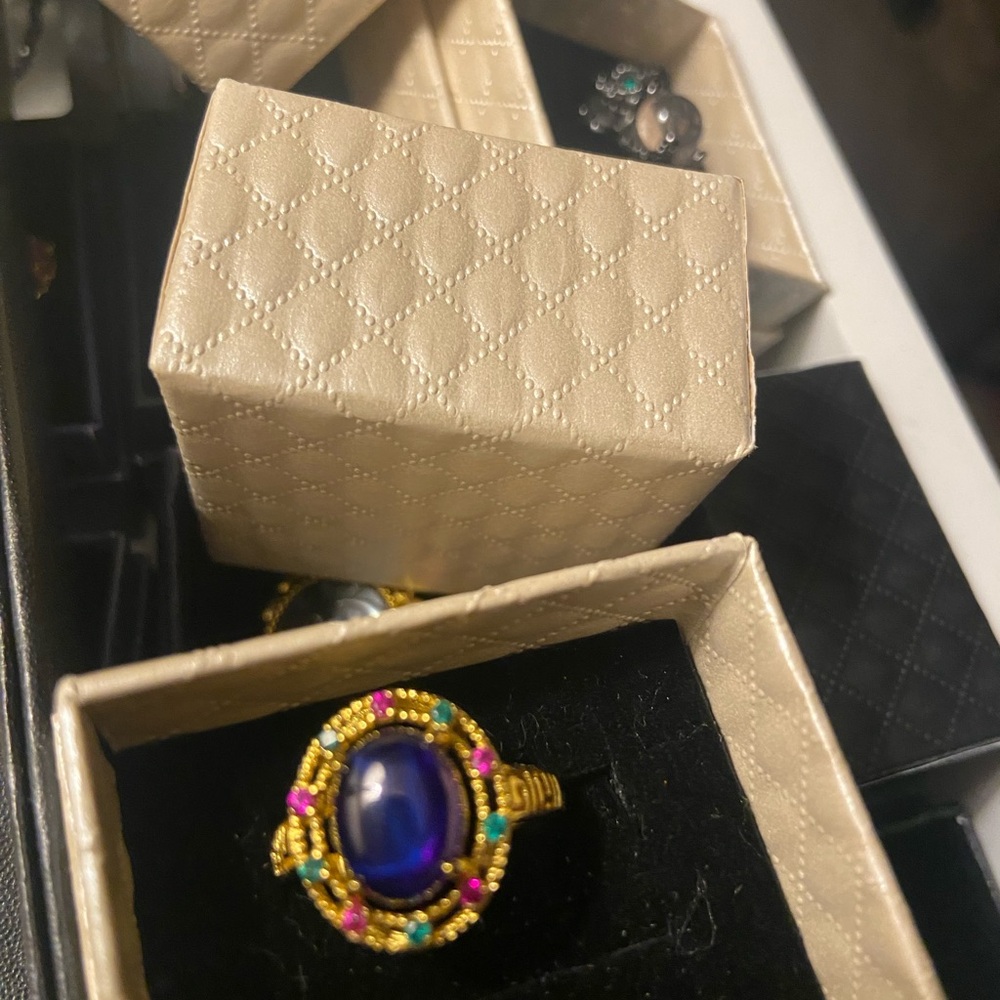 Elegant Gold and Purple Gemstone Ring